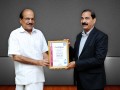 P. K. Kunhalikutty, Minister for Industries - Government of Kerala presenting ISO certification to Mawakeb Group CEO 